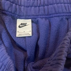 Women’s nike size medium deep purple (lapis) “trend essential fleece pants”